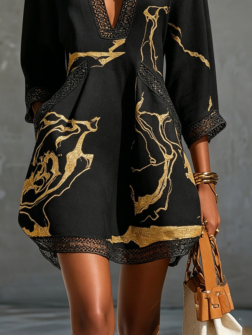 Alma – Vestido Negro con Estampado Dorado