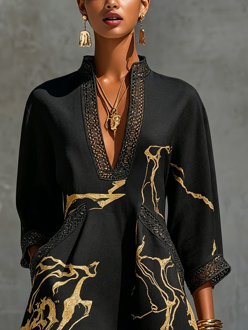 Alma – Vestido Negro con Estampado Dorado